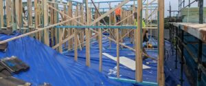 The Essential Applications of a Builders Tarp on the Jobsite